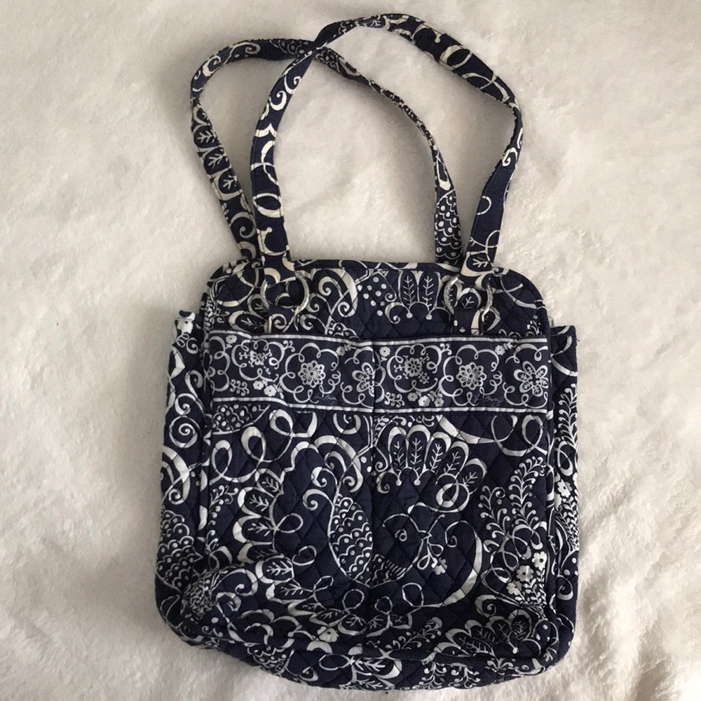 Navy Vera Bradley tote with long handles.